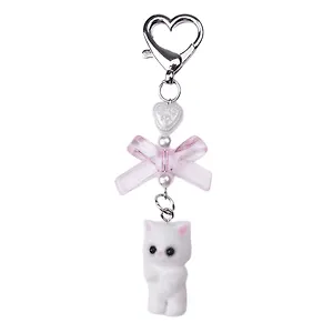 Брелок Котик-пушистик с бантиком (ПВХ) (12-04305-202506-cat3)