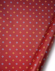 Бумага упаковочная 70*100см "Ромбики на бордовом фоне" глянц., инд.уп.