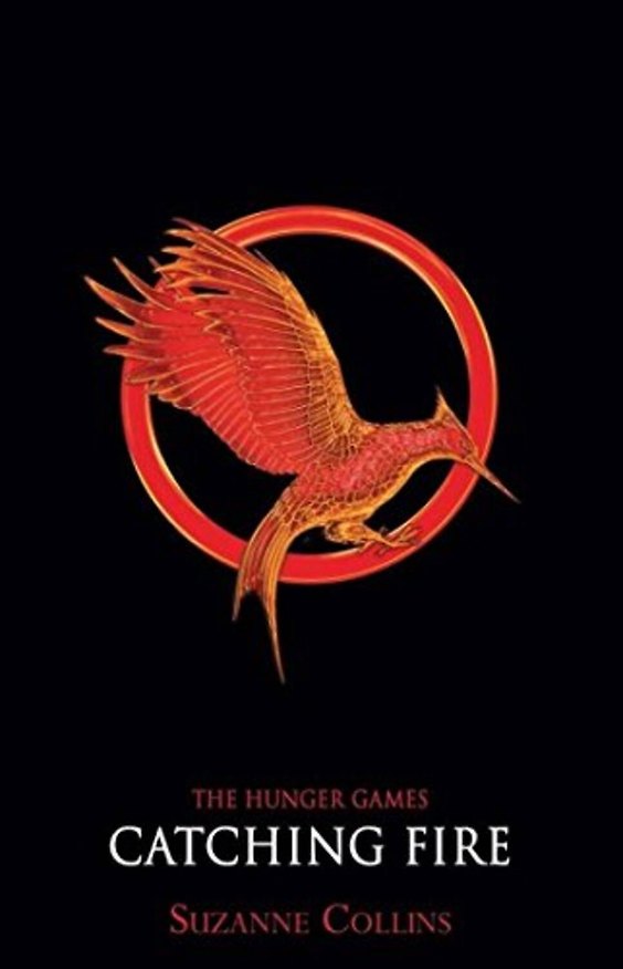 Книга The Hunger Games Catching fire (Suzanne Collins) Голодные игры И вспыхнет пламя (Сюзанна Коллинз) / Книги на английском языке (Сьюзен Коллинз) — 1
